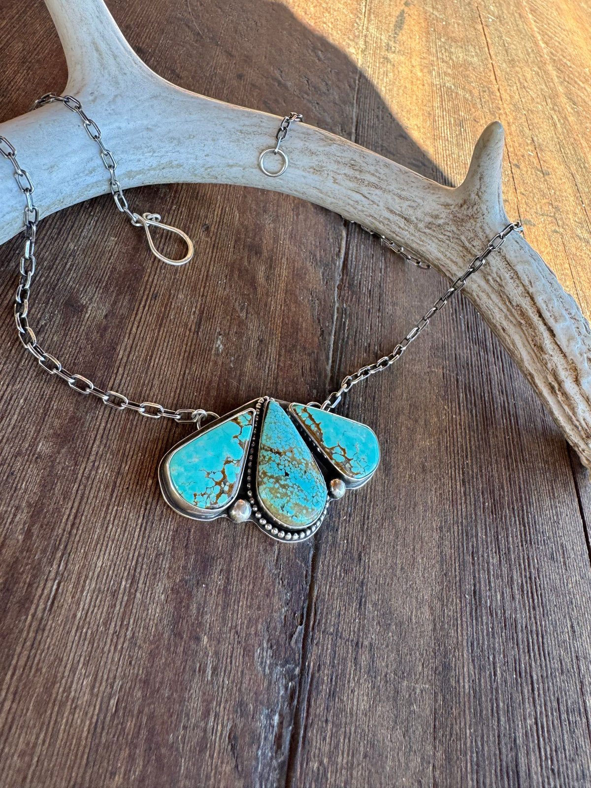 Sterling Silver Turquoise Pendant with 20” chain.