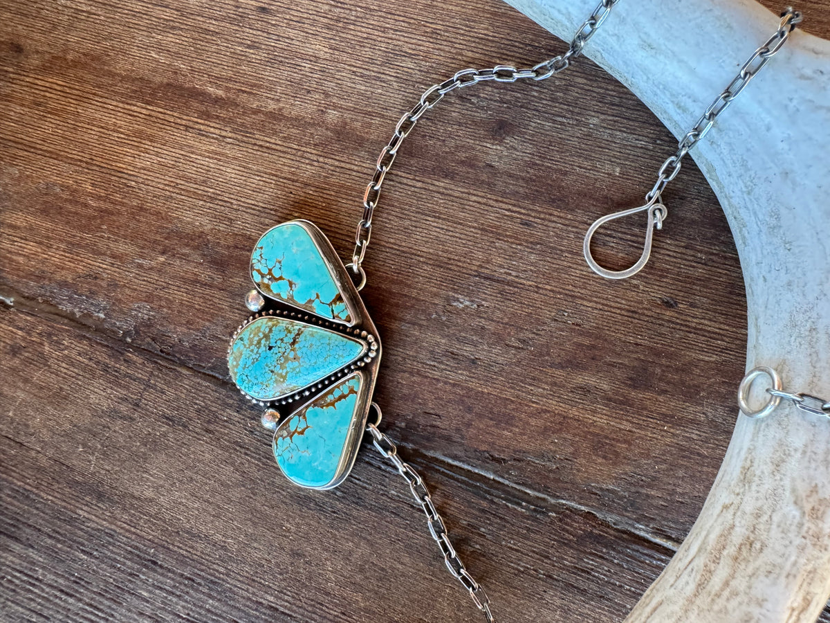 Sterling Silver Turquoise Pendant with 20” chain.