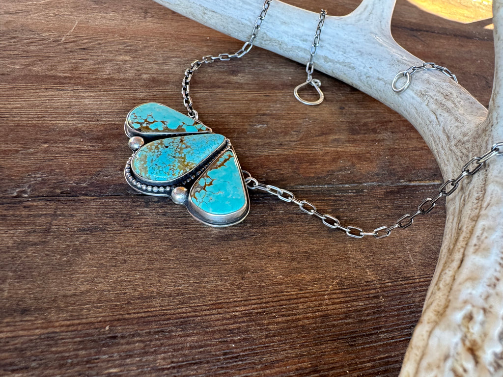 Sterling Silver Turquoise Pendant with 20” chain.
